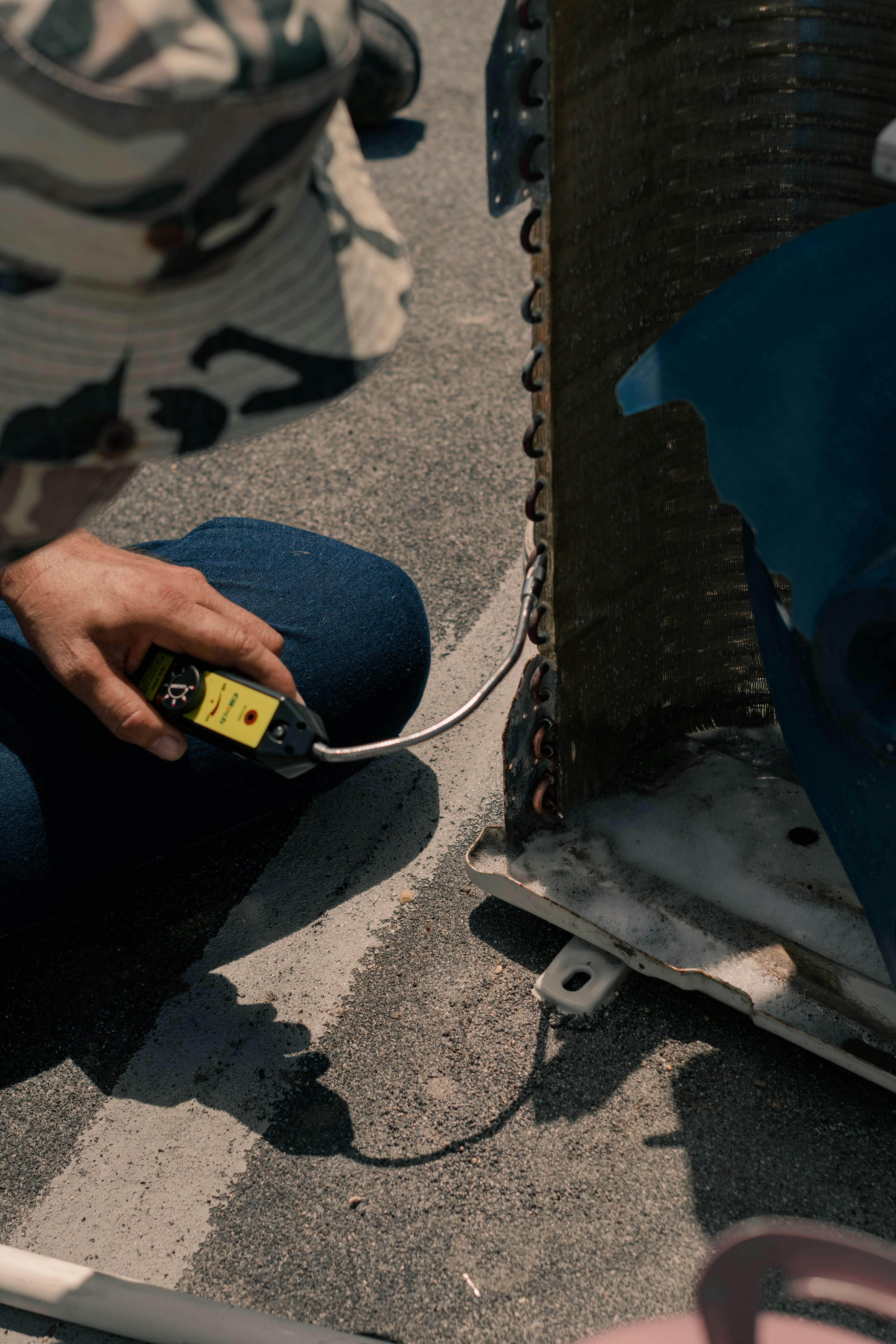 repairman working on a heater